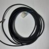Long black temperature sensor cable with metal probe at left and a white 2-pin connector with blue and brown wires in the middle.