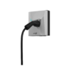 EV charging connector plugged into a wall-mounted SolarEdge charger unit with a black cable extending downward